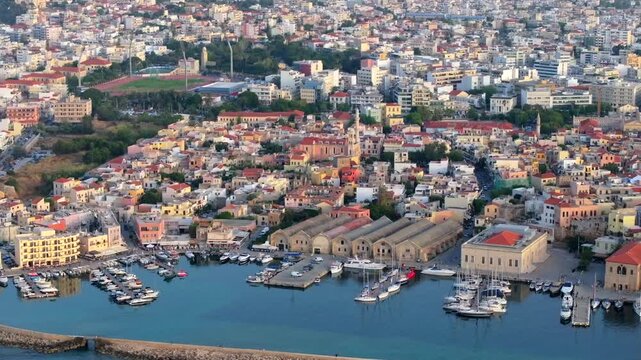 Beautiful Old city, Greece and best scenic places - panorama of picturesque old town Chania. Crete island, Panoramic of the old Venetian port and lighthouse during the blue hour, Travel Concepts