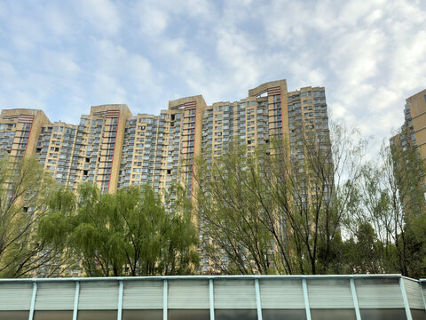 High rise apartment towers beside trees near Beijing Shanghai Expressway in Kunshan China