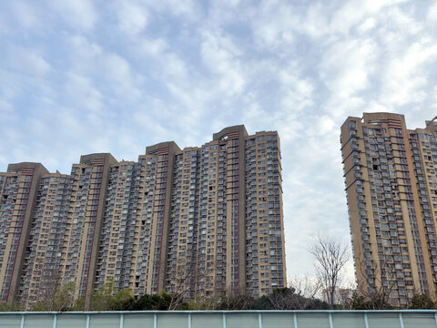 High rise apartment towers beside trees near Beijing Shanghai Expressway in Kunshan China