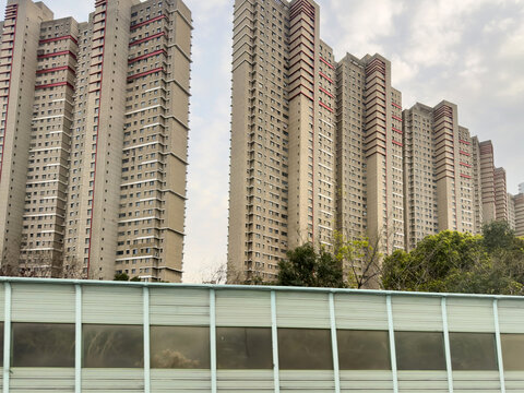 High rise apartment towers beside trees near Beijing Shanghai Expressway in Kunshan China