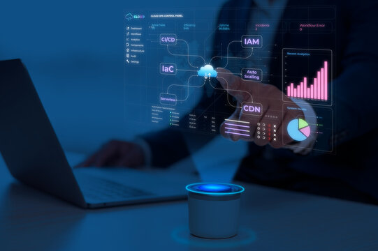 Businessman analyzing data on laptop with futuristic interface of cloud operations control panel 