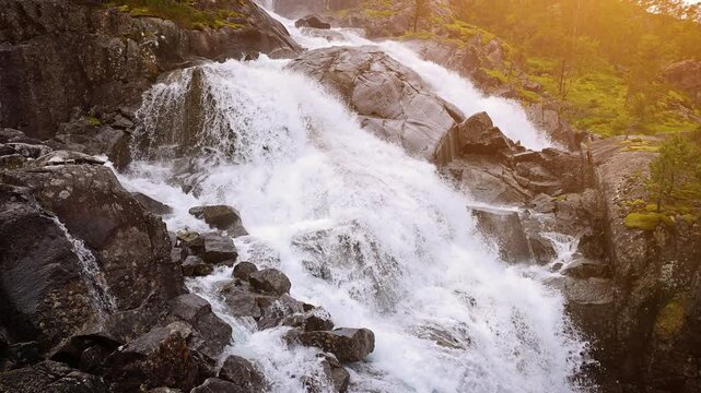 Seemlessly looping video of the amazing Langfossen waterfall in Norway