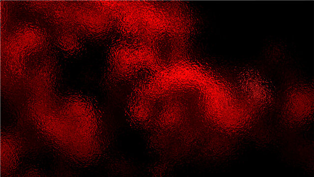 Abstract deep red textured blur with dark background evoking sense of intensity and mystery, an organic amorphous shape that implies hidden depths