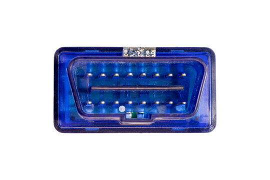 Close-up automotive OBD II diagnostic connector with metallic pin interface