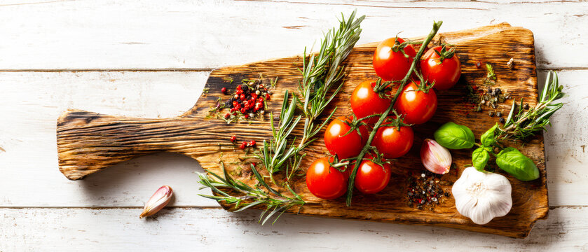 Fresh Cherry Tomatoes with Herbs and Spices on Rustic Wooden Board .AI Generative