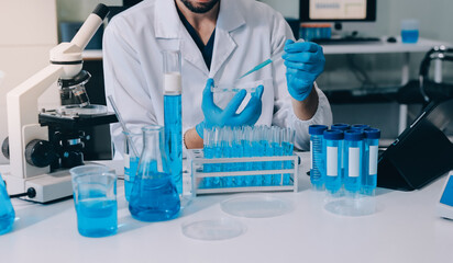 Fototapeta premium Lab technician experimenting in lab