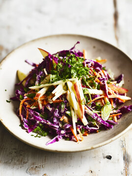 Fresh Red Cabbage Coleslaw with Apples, Carrots and Herbs. AI generative.