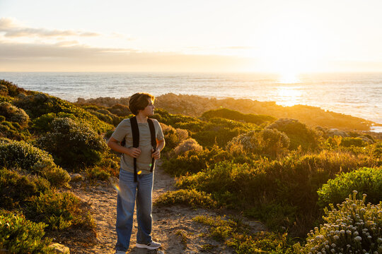 child, boy young boy, active, exercise, exploring, sunset, coastline, dekelders, South Africa, western cape, nature, walking, people, path, landscape, waves, water, ocean, sea,  travel, summer, person