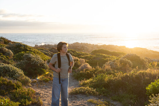 child, boy young boy, active, exercise, exploring, sunset, coastline, dekelders, South Africa, western cape, nature, walking, people, path, landscape, waves, water, ocean, sea,  travel, summer, person