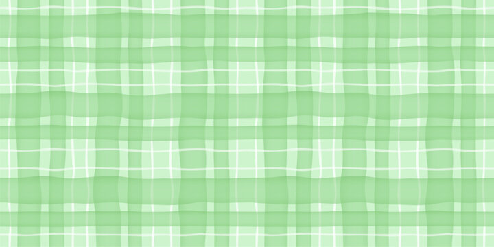 Seamless green plaid pattern in classic textile style. Soft design perfect for fabric, wrapping, wallpaper and decorative backgrounds.