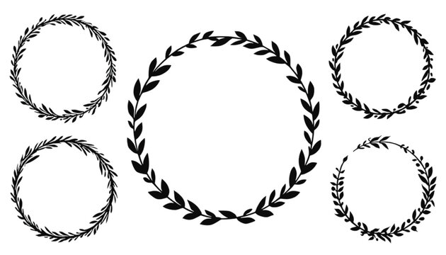 Collection of circular leaf wreaths and branches arranged artistically on a white background.
