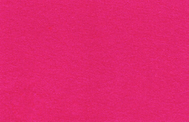 Fototapeta premium Bright pink paper texture background with soft handcrafted surface. Vibrant abstract backdrop for creative and modern designs.