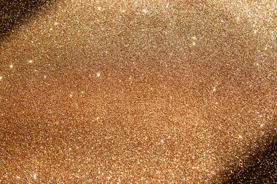 Gold glitter background with sparkling shimmer and luxurious metallic texture for festive designs