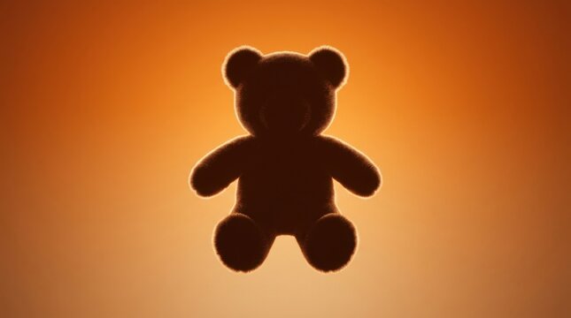 Minimalist composition featuring a brown teddy bear silhouette against a warm orange gradient background. The bear is seen from
