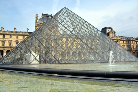 PARIS, FRANCE: View of Inverted Pyramid (architect Pei Cobb Freed) in Louvre Museum at sunset. With 8.8 million annual visitors, Louvre is consistently most visited museum worldwide. 