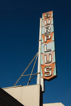 Army surplus neon sign in Pasadena, California, August 2020