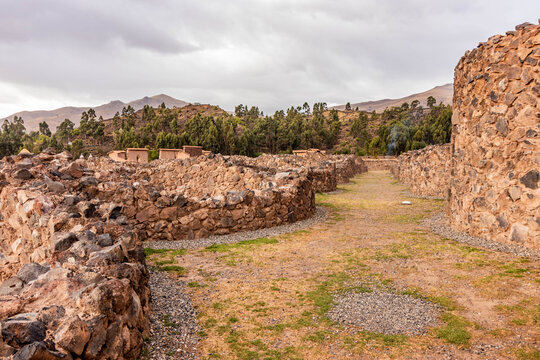 Qullqa (Colca) storage houses in Raqchi complex, Peru
