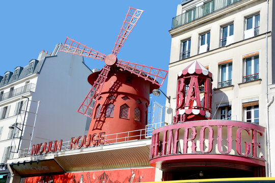 
PARIS FRANCE: The Moulin Rouge in Paris, France. Moulin Rouge is a famous cabaret built in 1889, locating in the Paris red-light district of Pigalle. in Paris
