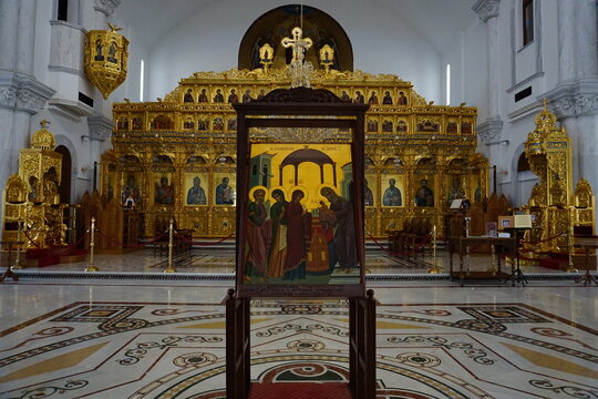 Interior of the historic Apostle Barnabas Cathedral (Church of St. Barnabas and St. Makarios) with a medieval painting and ornate golden altar in Nicosia, Cyprus
