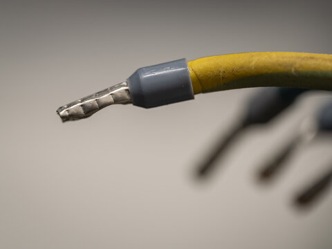 Close-up of a wire ferrule crimped on a cable.