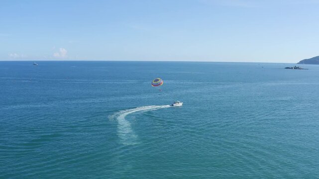 Parasailing Boat on Calm Blue Ocean