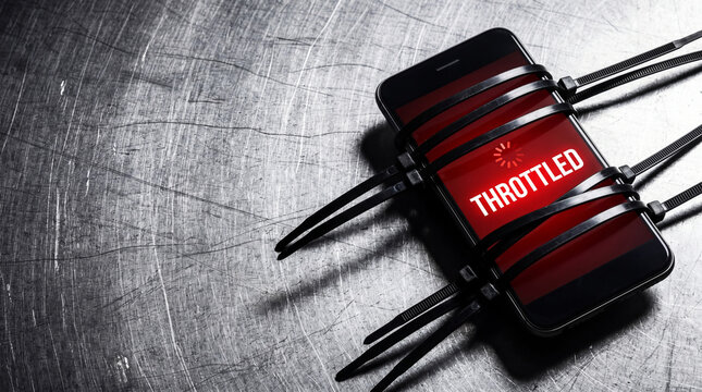 Smartphone tied with plastic straps showing loading icon and throttled text. Internet speed restriction on mobile device. Concept of censorship, website blocking and digital limitation.