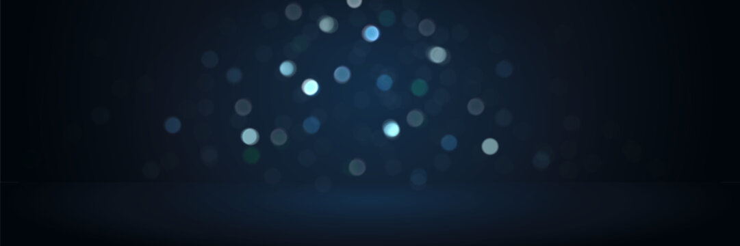 Abstract soft blue bokeh lights on dark background for luxury product display backdrop.