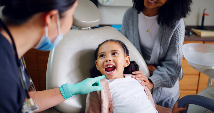 Child, mouth and consultation with dentist in office for dental checkup, show cavity and extraction. Mother, kid and paediatric hygienist for oral health, teeth whitening and inspection for cleaning