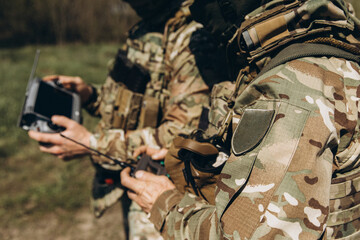 Ukrainian soldiers operating drone remote control system © Dmytro