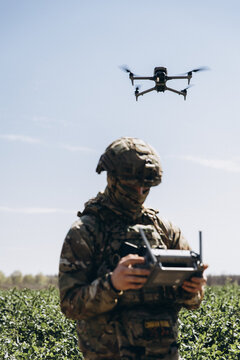Ukrainian soldier flying reconnaissance drone for surveillance operation