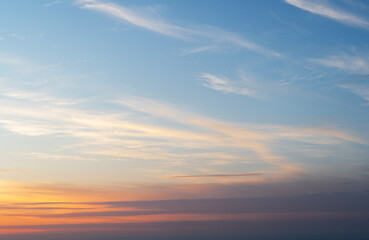 Obraz premium Clouds at sunset on the sky.