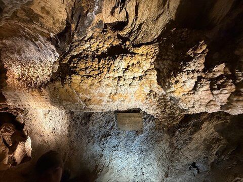 Interior of Zbra&scaron;ovsk&eacute; aragonitov&eacute; jeskyně with illuminated rock formations and aragonite structures