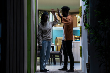 Fototapeta premium Black couple, heated argument, violent fight with yelling, boyfriend and girlfriend, arguing due to disagreement and everyday life drama, People in angry dispute, toxic relationship.