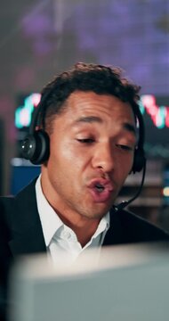 Frustrated, businessman or consultant with headset for stock market crash or bankruptcy in office. Man, broker or agent with difficult customer for financial crisis, debt mistake or bad investment