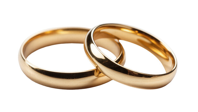 Isolated two beautiful shining gold wedding bands intertwined symbolizing lasting love and commitment