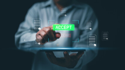 Fototapeta premium Digital approval workflow concept. Man using smartphone with virtual document approval interface showing accept and decline options. Online contract confirmation and paperless decision technology.