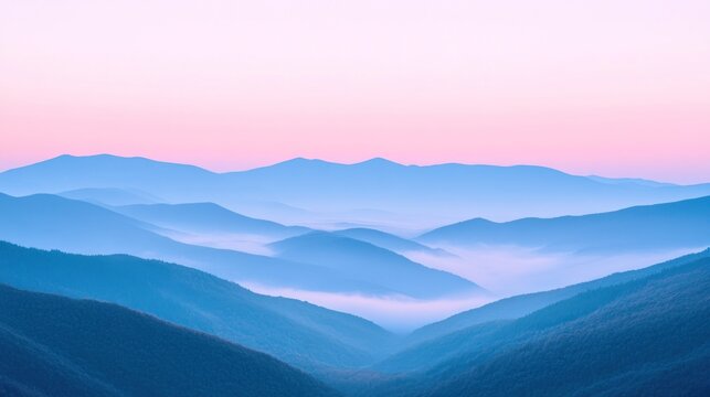 Misty mountain range at dawn.