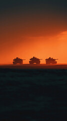 Obraz premium Military tanks advancing at sunset battlefield photo dramatic atmosphere silhouette warfare concept