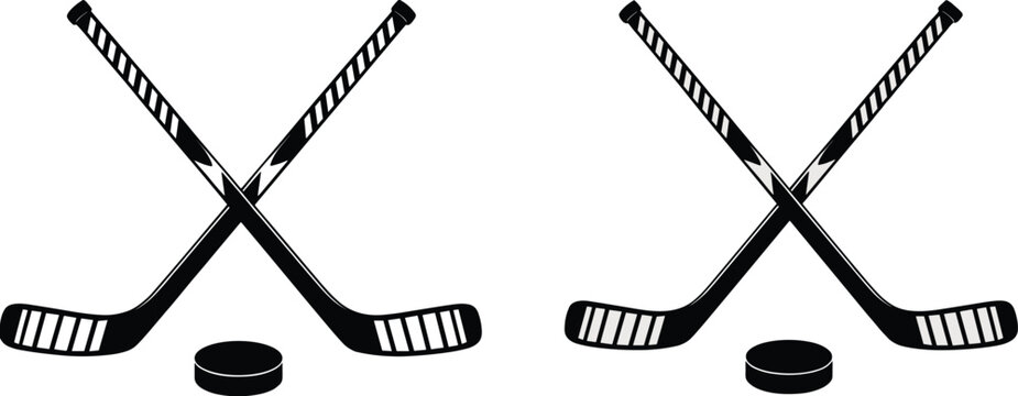 Crossed hockey sticks and pucks in two styles hockey puck
