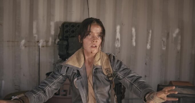 Young, beat up adventurer being cornered in shed then trying to threaten off-screen people with ball