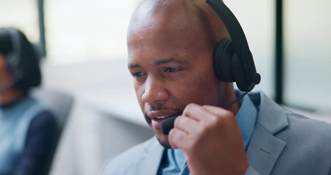 Agent, man or consulting with headset in call center for client support, loan advice or chat. Coworking, finance consultant or talking at helpdesk for insurance claim, online help or customer service