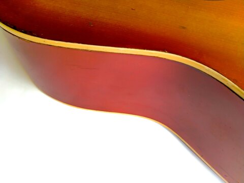Elegant Guitar Wood Grain and Body Curve Detail