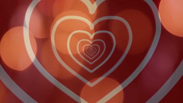 When loop starts, concentric white hearts breathing, bokeh orbs shifting and fading for warm scene