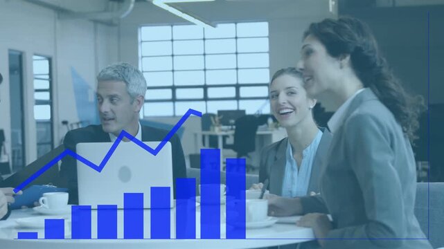 Business team growing at round table, laptop input initiating blue bar chart rising, sharing smiles