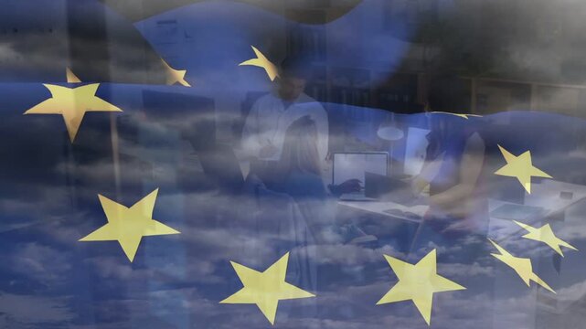 Team leaning toward monitor and reviewing docs for business with moving EU flag overlay appearing