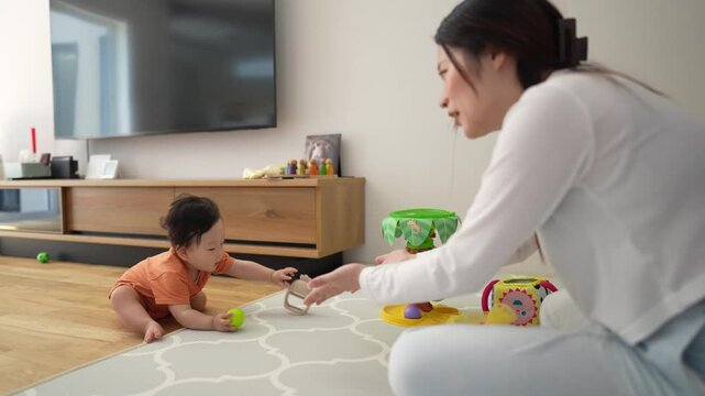 Mother and child play together on floor. Baby crawls, eyes wide with curiosity. Mother smiles, hands gently guiding. Soft light fills cozy living room space. Perfect for parenting, child development