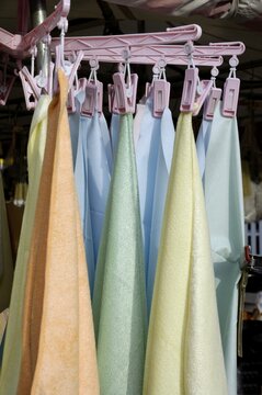 Cleaning towels hanging on clapms , Auer Dult fair, Munich