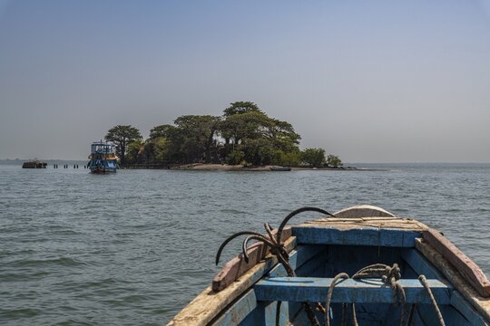 Boats approaching Unesco site Kunta Kinteh or James island, Western slave trade, Gambia