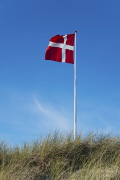 Danish flag waving in the wind, Skagen, Denmark