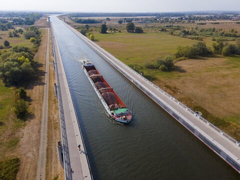 Drone shot, cargo ship on the Mittelland Canal, Magdeburg waterway junction, canal bridge, Mittelland Canal, Elbe, Magdeburg, Saxony-Anhalt, Germany